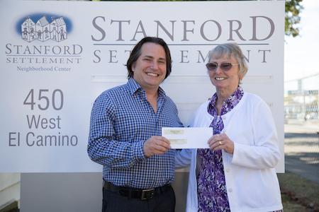 Stanford Settlement check presentation: Danny Hayes, CEO of Danny Wimmer Presents and Sister Jeanne Felion, Stanford Settlement. Photo by Lisa Nottingham/Visit Sacramento.