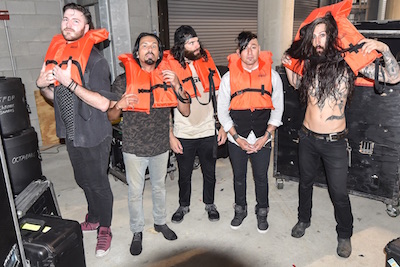 Pop Evil poses with lifejackets for the Life Looks Good On You campaign