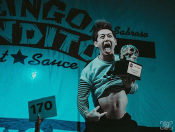 Takeru Kobayashi celebrating victory at Sabroso Craft Beer, Taco & Music Festival powered by Gringo Bandito