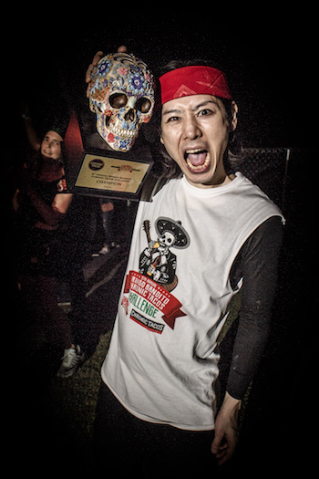 Takeru Kobayashi with his Gringo Bandito Taco Challenge trophy at Sabroso, photo by Lizzy Gonzalez