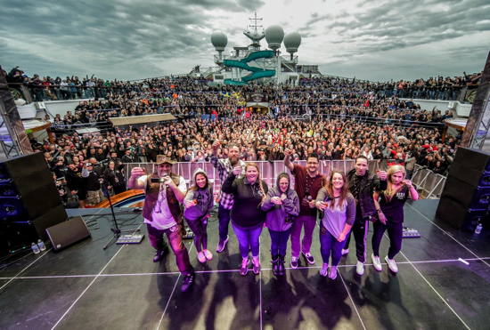 ShipRocked crowd and staff on deck for the annual sailaway 'family photo'